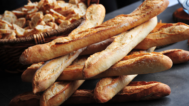 pile of slim French baguettes