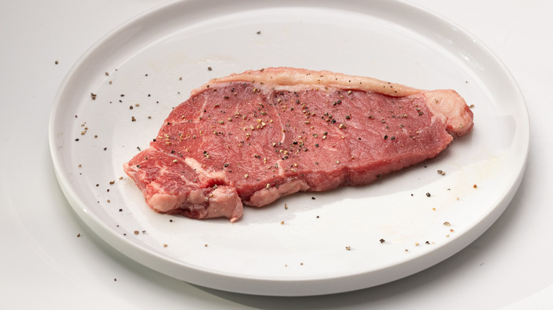 seasoned steak on a plate