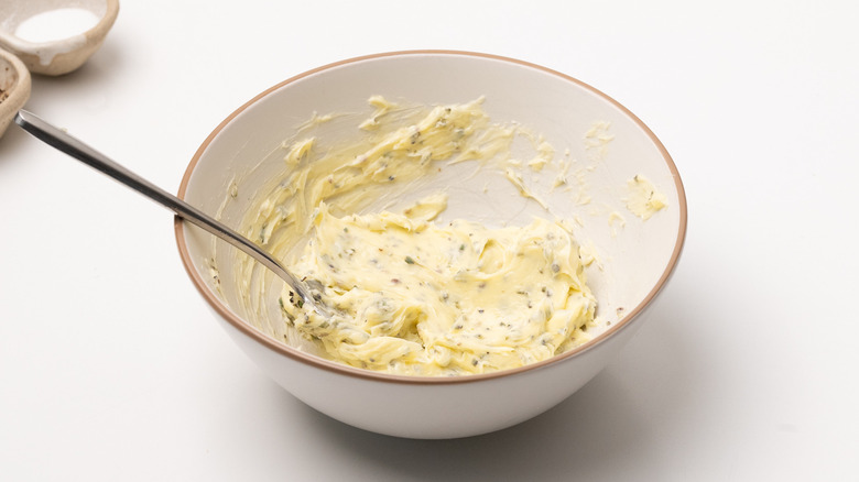 mixing compound butter in bowl