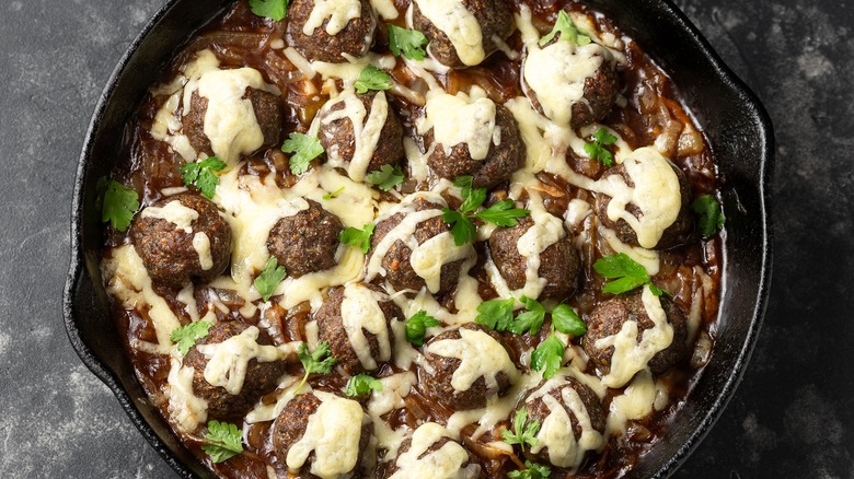 french onion meatballs in skillet