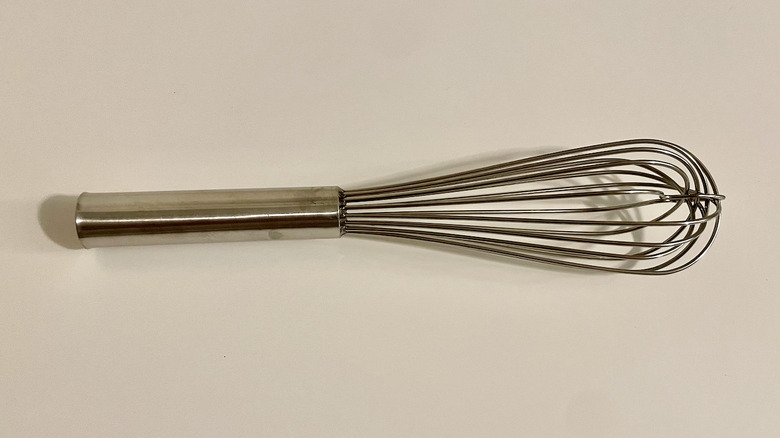 French whisk on table