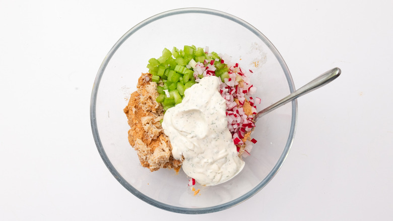 making crab salad in bowl