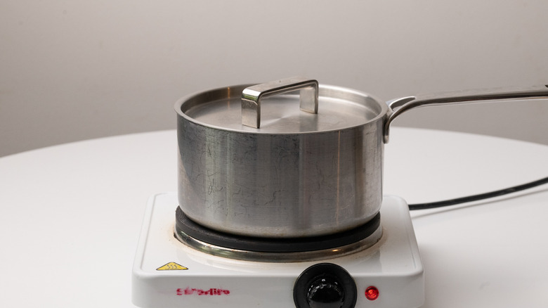 saucepan on heating element