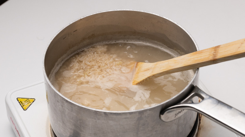 rice cooking in saucepan