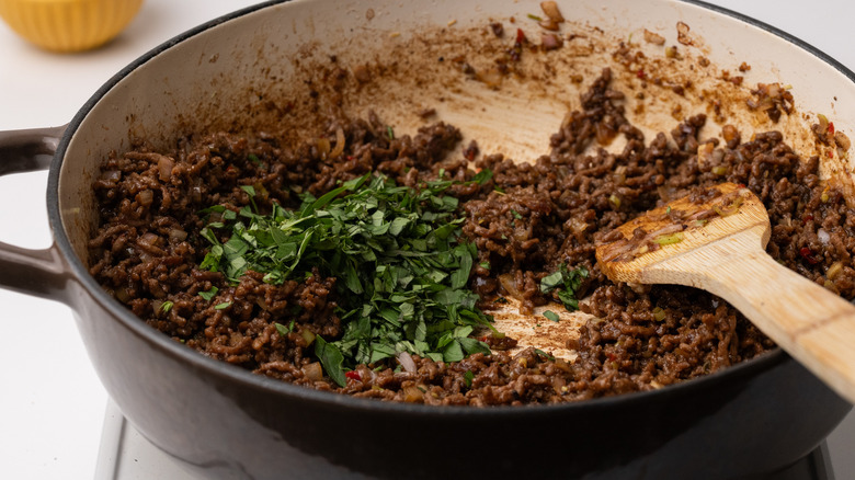 Cooking Thai basil beef