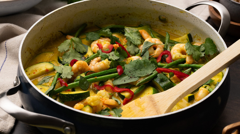 Thai shrimp curry with garnishes