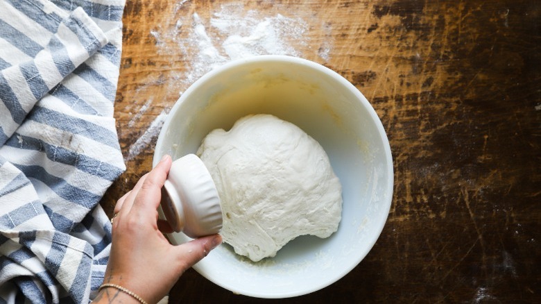 adding salt to sourdough dough