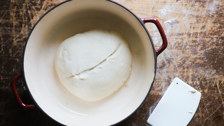 ball unbaked dough in pot