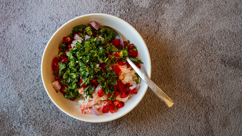 ingredients mixed in bowl with spoon