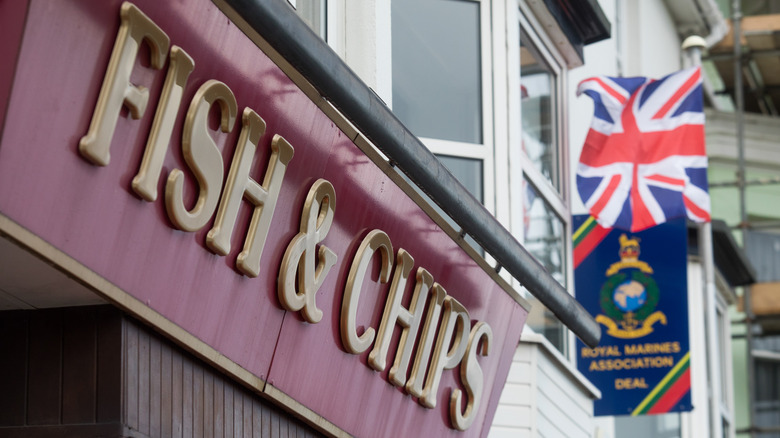 Fish and Chips sign beside a Union Jack flag