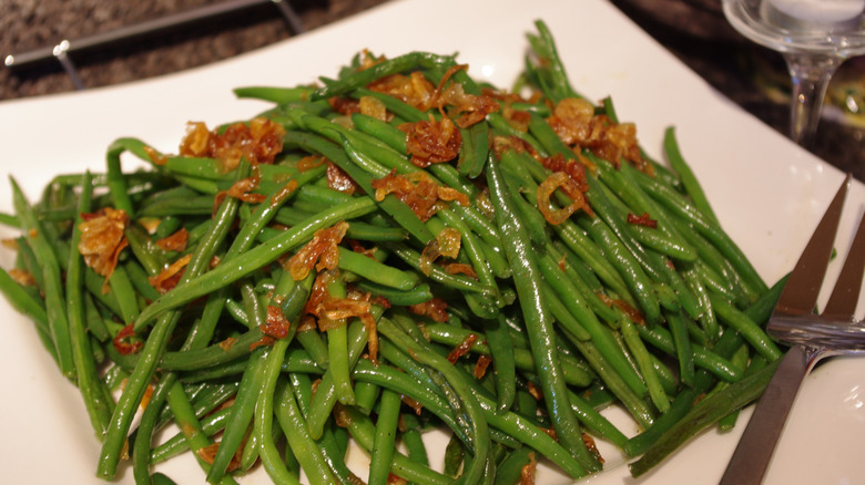 Fried onions on sauteed green beans