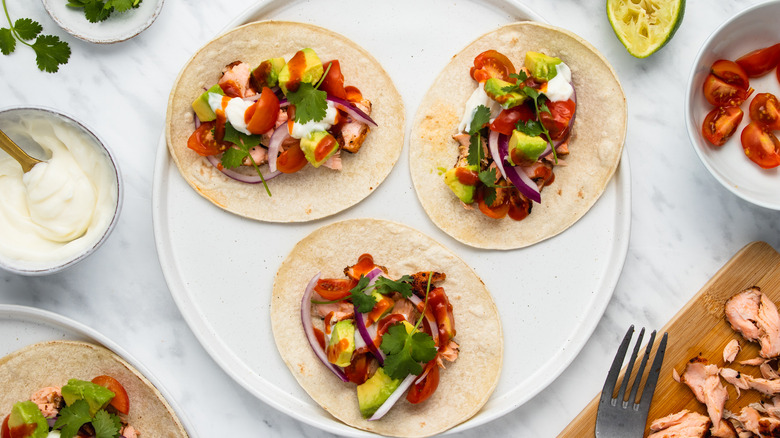 plated fried salmon tacos