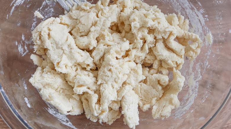 shaggy biscuit dough in bowl