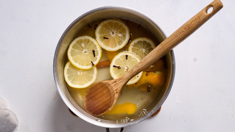 lemon slices and spoon in pot