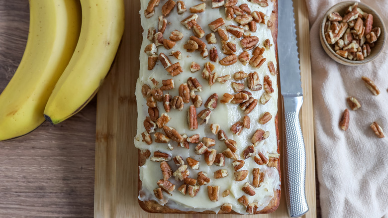 frosted hummingbird bread on a cutting board