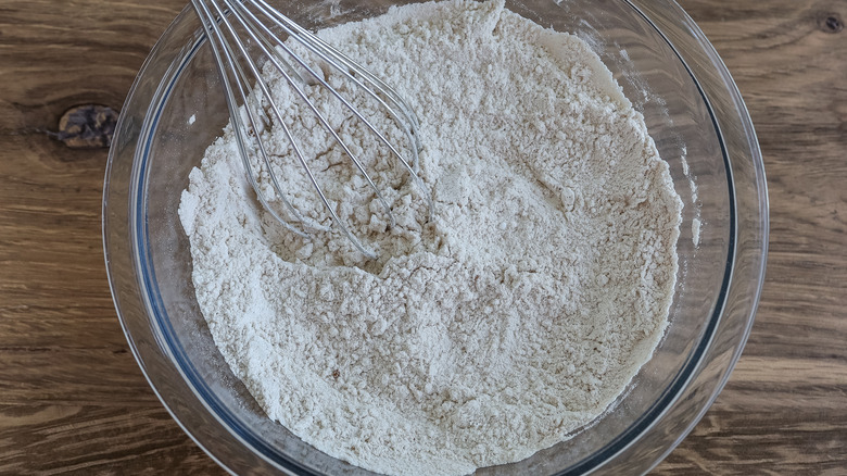 dry ingredients in a bowl with a whisk