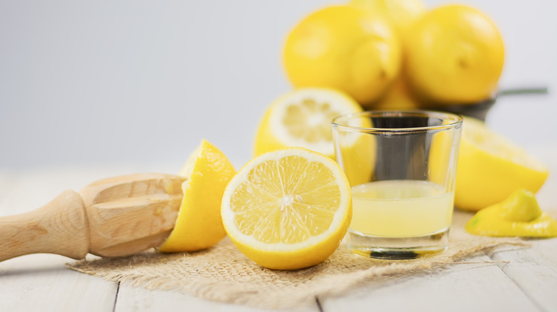 Halved lemons with juice