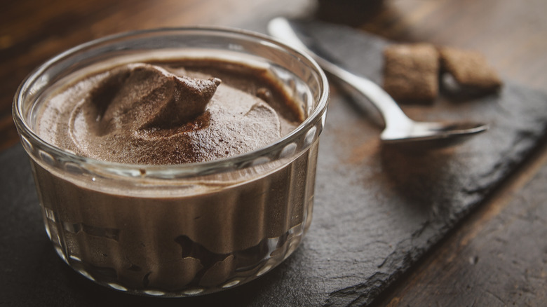 Chocolate pudding with spoon