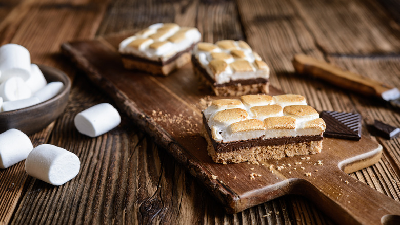 s'mores bars on wooden board