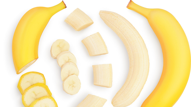 Banana slices on white background