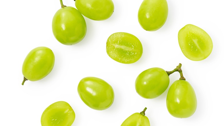 Sliced grapes on white