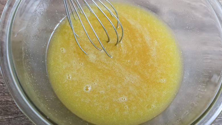 whisking butter egg sugar mixture