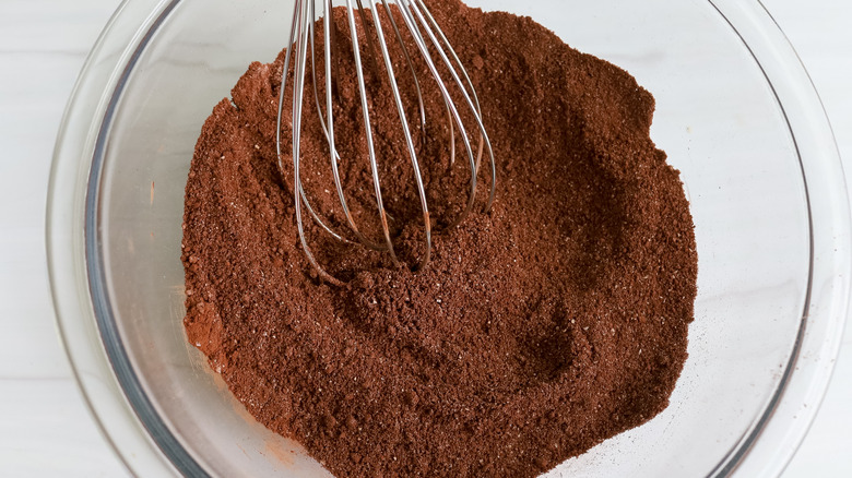 brownie ingredients whisked in bowl