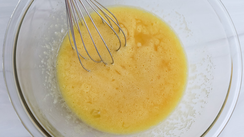 wet ingredients whisked together in a bowl