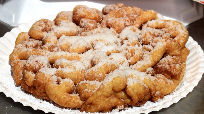 Funnel cake on a paper plate