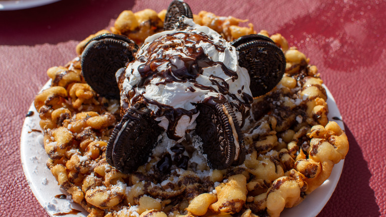 Funnel cake with cookies and whipping cream