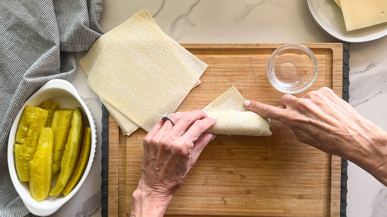 fingers sealing eggroll