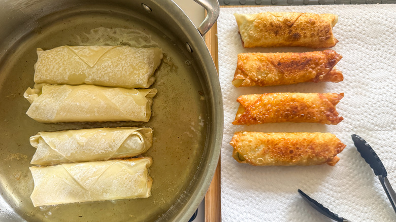 eggrolls in pan and drying