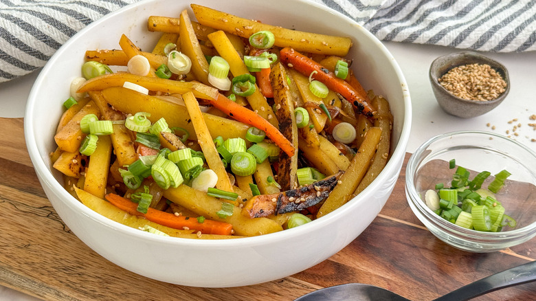 white bowl of gamja bokkeum