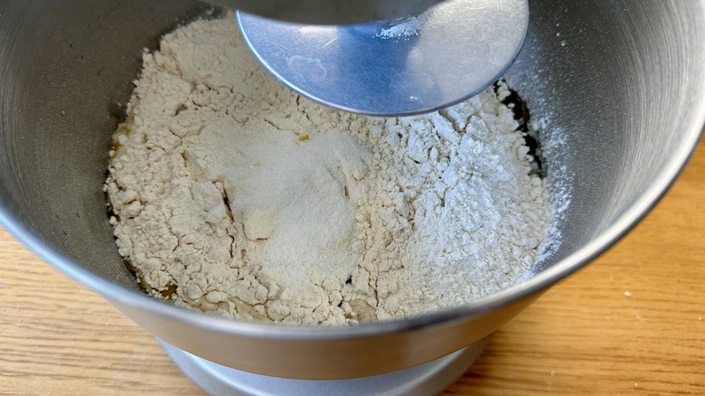 Mixing focaccia dough in bowl