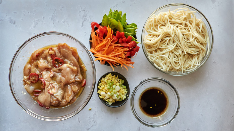 ingredients prepped in bowls on a table