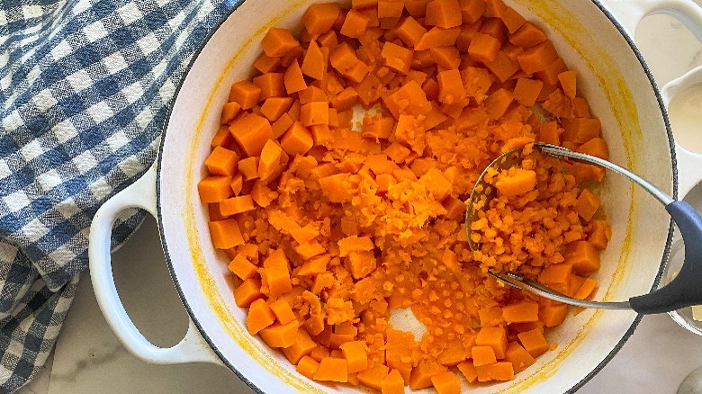 diced sweet potato in pot