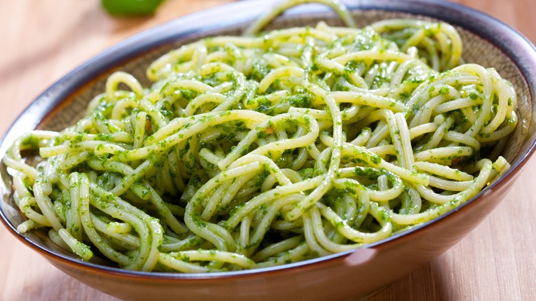 Pesto spaghetti in bowl