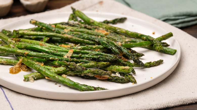 Garlic parmesan roasted asparagus on plate