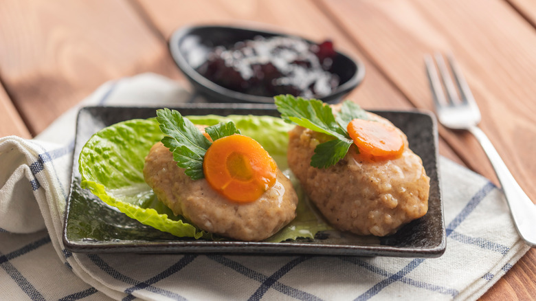 gefilte fish with carrot slices