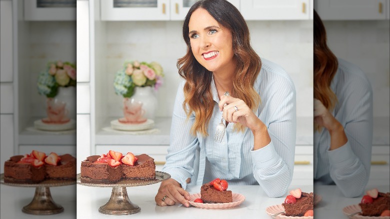 Gemma Stafford posing with cake