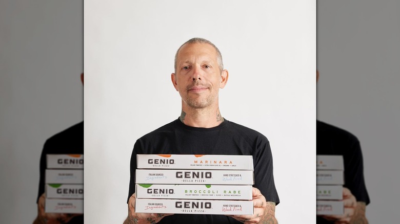 Anthony Mangieri holding pizza boxes