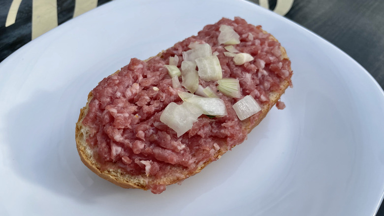 mettbrötchen on white plate