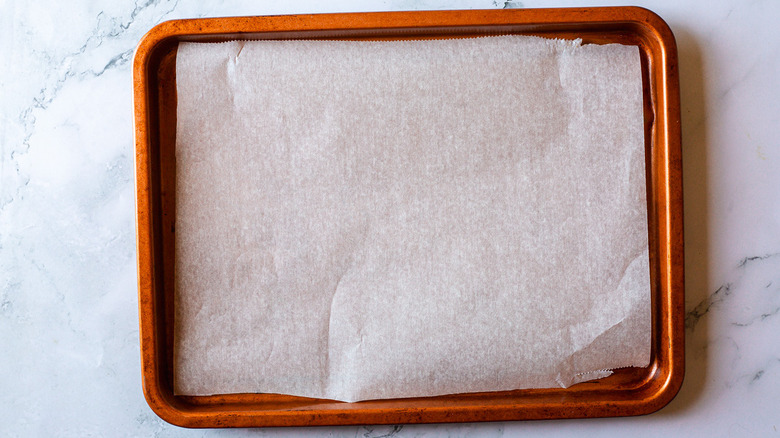 baking sheet topped with parchment paper