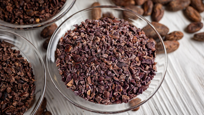 Ground cocoa beans in a bowl