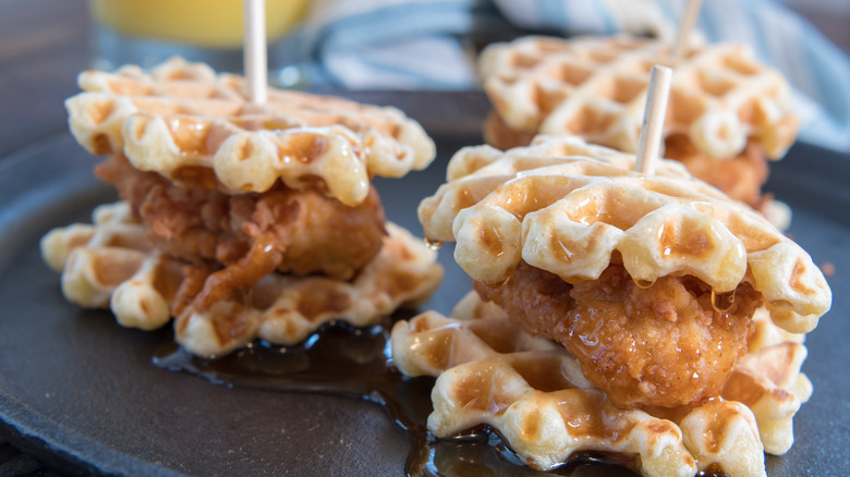 Chicken and waffle skewers on a plate