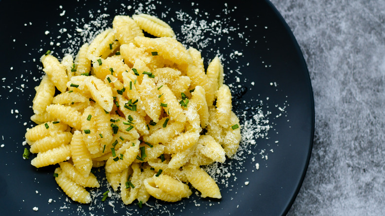 Gnocchetti pasta with cheese on plate