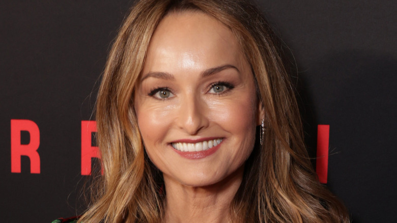 giada de laurentiis smiling in red and black blazer