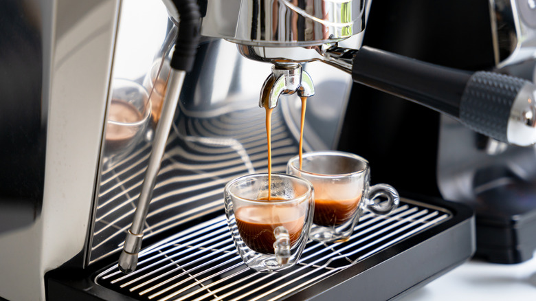Espresso machine brewing two fresh shots