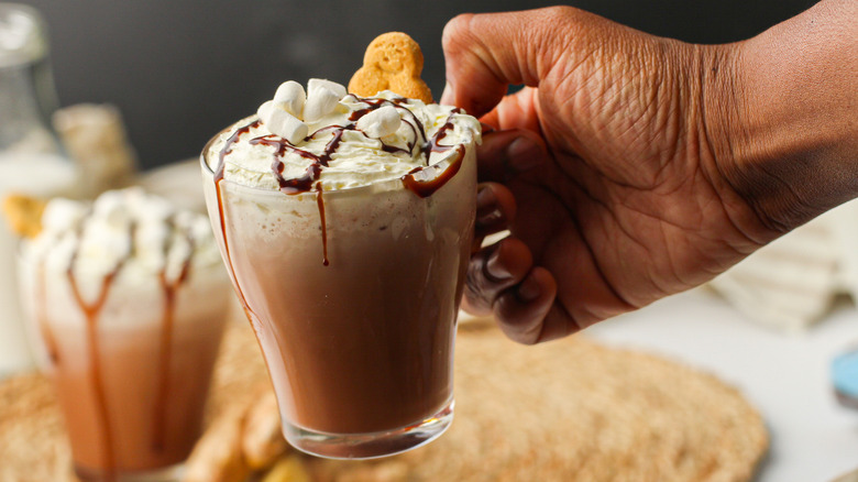 hand holding ginger hot chocolate