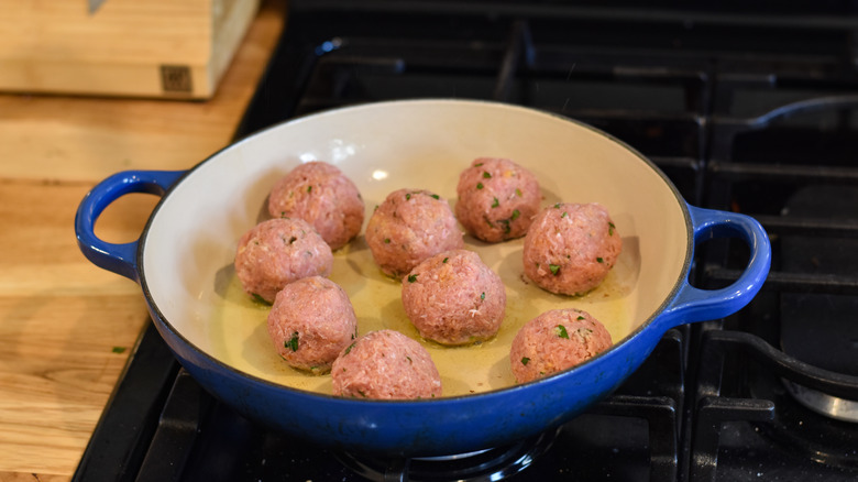 turkey meatballs cooking in pot